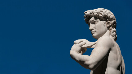 Michelangelo's David, a masterpiece of sculpture symbol of Italian Renaissance. Outdoor replica in...