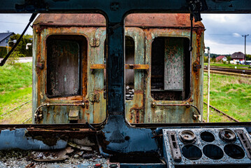 View from the driver's cabin of an old damaged passenger electric train
