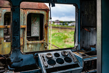 View from the driver's cabin of an old damaged passenger electric train