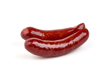 German grilled pork sausages, close-up, isolated on white background.