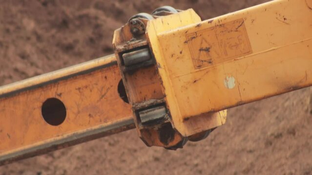 retractable telescopic boom mechanism in excavator, close-up