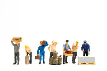 Miniature people , Worker team standing on white background, Labour day concept