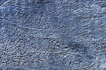 Blue stone texture close-up. Rough blue stone wall. Natural rock texture