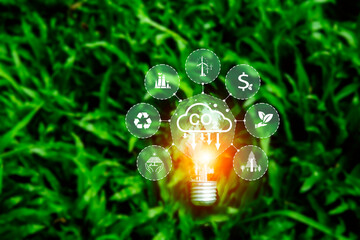 Carbon credit market concept. Green energy carbon neutral Net zero greenhouse gas emissions target at 2050. ethical, eco green energy system icon around CO2 icon on green background.