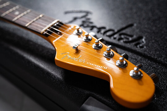 Bangkok, Thailand - July 3, 2023: Fender, an American guitar manufacturer, logo on an electric guitar.