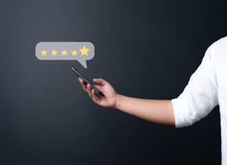 Customer feedback review satisfaction survey concept. Client gives rating for service experience on online application. User evaluate quality of services lead to improve quality of business services.