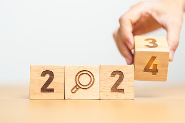 2024 block with magnifying glass icon. SEO, Search Engine Optimization, hiring , Advertising, Idea, Strategy, marketing, Keyword, Content and New Year start concepts