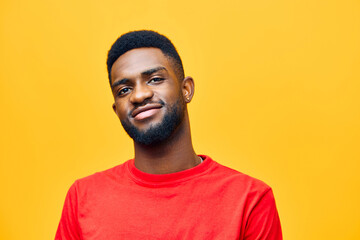 Obraz premium black man american face american orange african guy portrait colourful background red fashion