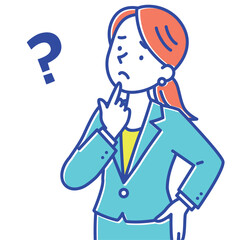 立って考え事をしているスーツ姿の女性