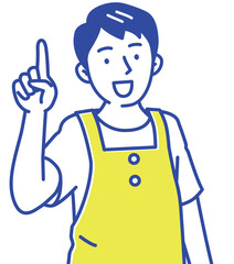 いいこと思いついたエプロン姿の若い保育士の男性