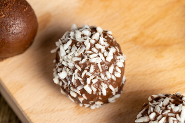 Chocolate candies with coconut flavor and filling
