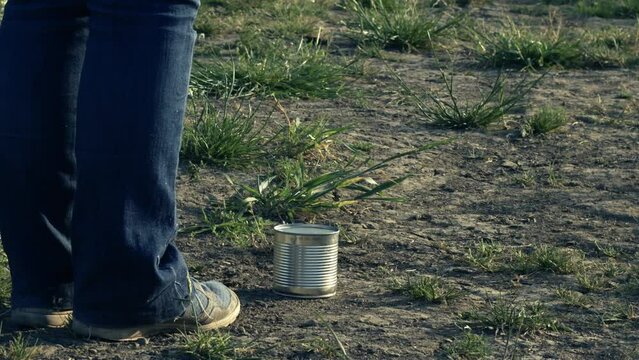 Kicking the can down the road metaphor concept 