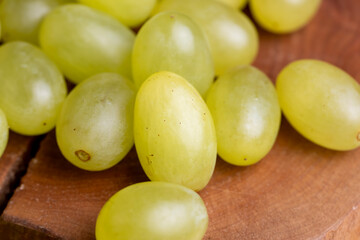 Green yellow grapes grown in a home vineyard
