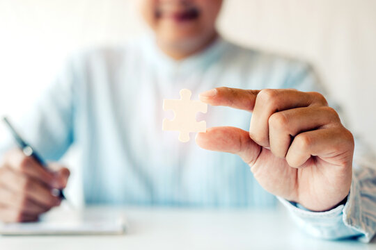 Close-up of important jigsaw puzzles in business Design concepts plan for success.