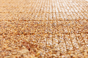 Automatic production line for making snacks from peanuts, pine nuts, healthy kozinak cake. Concept modern food industry