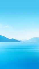 a blue water with mountains in the background