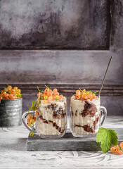 yogurt dessert with currants in a glass