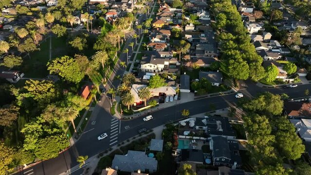 Aerial View of Culver City, Residential Neighborhood of Homes and Street Traffic on Golden Hour Sunlight