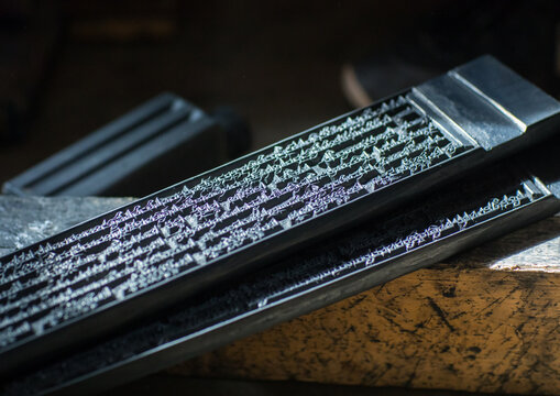 Tibetan scriptures printed from wooden blocks in the monastery traditional printing temple, Gansu province, Labrang, China