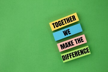 colored paper with the words TOGETHER WE MAKE THE DIFFERENCE