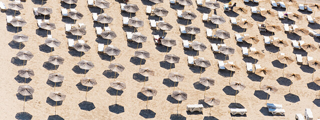 Top view of beach with white umbrellas. Golden sands, Kavarna, Bulgaria. Banner