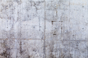 Grungy and smooth bare concrete wall