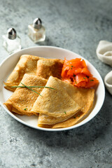 Homemade crepes with smoked salmon	