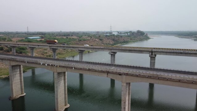 Highway bridge built over the river basin in the Indian rural terrain