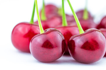 Freshly picked heap of cherries close up.