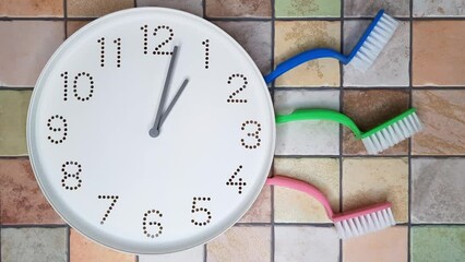 1 o'clock, afternoon. Cleaning time. Hyperlapse. Clockwise movement of clock hands after One o'clock. Clock and cleaning scrubbing brush on tiled wall background. kitchen and house cleaning schedule