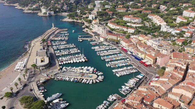 Aerial photo of Cassis, South of France. Cassis Harbour and Mediterranean coast visible from above.