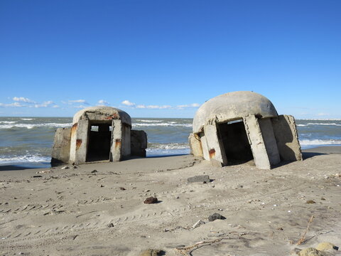 2 abandoned concrete pillbox bunkers on the Albanian coast