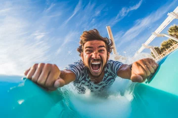 Photo sur Plexiglas Parc dattractions Excited man having fun on water slide in amusement park. Generative AI