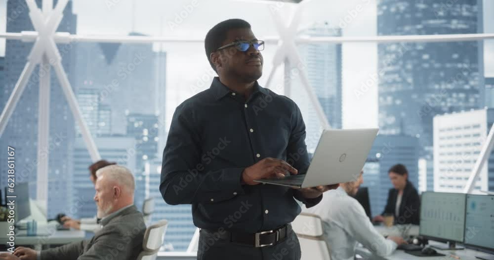 Poster african american financial analyst walking in skyscraper office with diverse employees in downtown. 