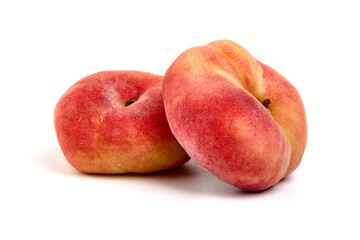 Flat Peaches, ripe nectarines, isolated on white background.