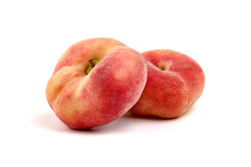 Flat Peaches, ripe nectarines, isolated on white background.
