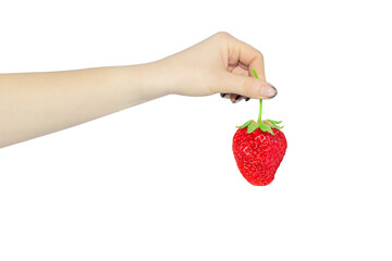 strawberry in hand isolated from background, concept to pass or throw away