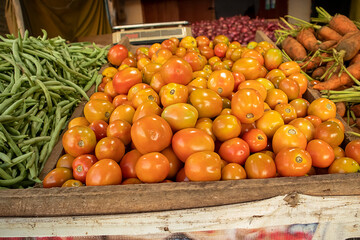 Green beans and tomatoes at a farmers market