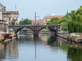 Fototapeta premium Bridge across the river for trains. Stone bridge over the river.