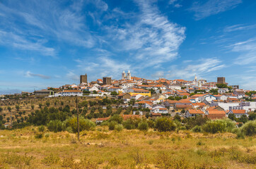 Picturesque village of Avis, in the Alentejo region of Portugal. Traditional Alentejo houses, in blue, white and yellow colors, cobbled streets and decorated doors