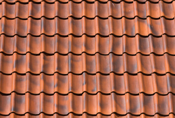 Red tiles roof background