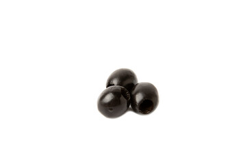 Tasty black olives isolated on white background. Olive and olive tree branches on a white table. Delicacy.