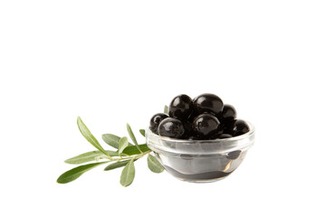 Tasty black olives isolated on white background. Olive and olive tree branches on a white table. Delicacy.