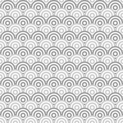 Fototapeta premium Seamless japanese pattern with scales. Fish scale wallpaper. Asian traditional ornament with repeated scallops. Repeated circles and semicircles background. Vinyl motif. Surface design. Vector art.