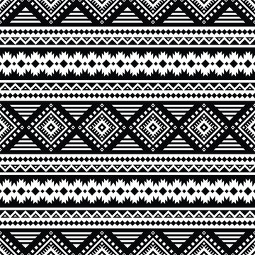 Geometric abstract seamless ethnic pattern. Tribal motif design for textile. Black and white colors.