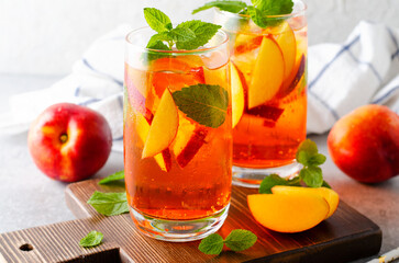 Peach Lemonade, Refreshing Drink, Cocktail, Iced Tea, Tasty Peach Cold Summer Drink on Bright...