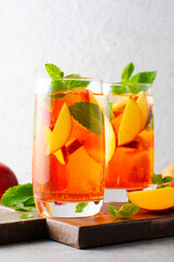 Peach Lemonade, Refreshing Drink, Cocktail, Iced Tea, Tasty Peach Cold Summer Drink on Bright Background