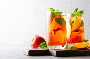 Peach Lemonade, Refreshing Drink, Cocktail, Iced Tea, Tasty Peach Cold Summer Drink on Bright Background