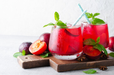 Plum Lemonade, Refreshing Drink, Cocktail, Iced Tea, Plum Summer Drink on Bright Background