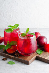 Plum Lemonade, Refreshing Drink, Cocktail, Iced Tea, Plum Summer Drink on Bright Background